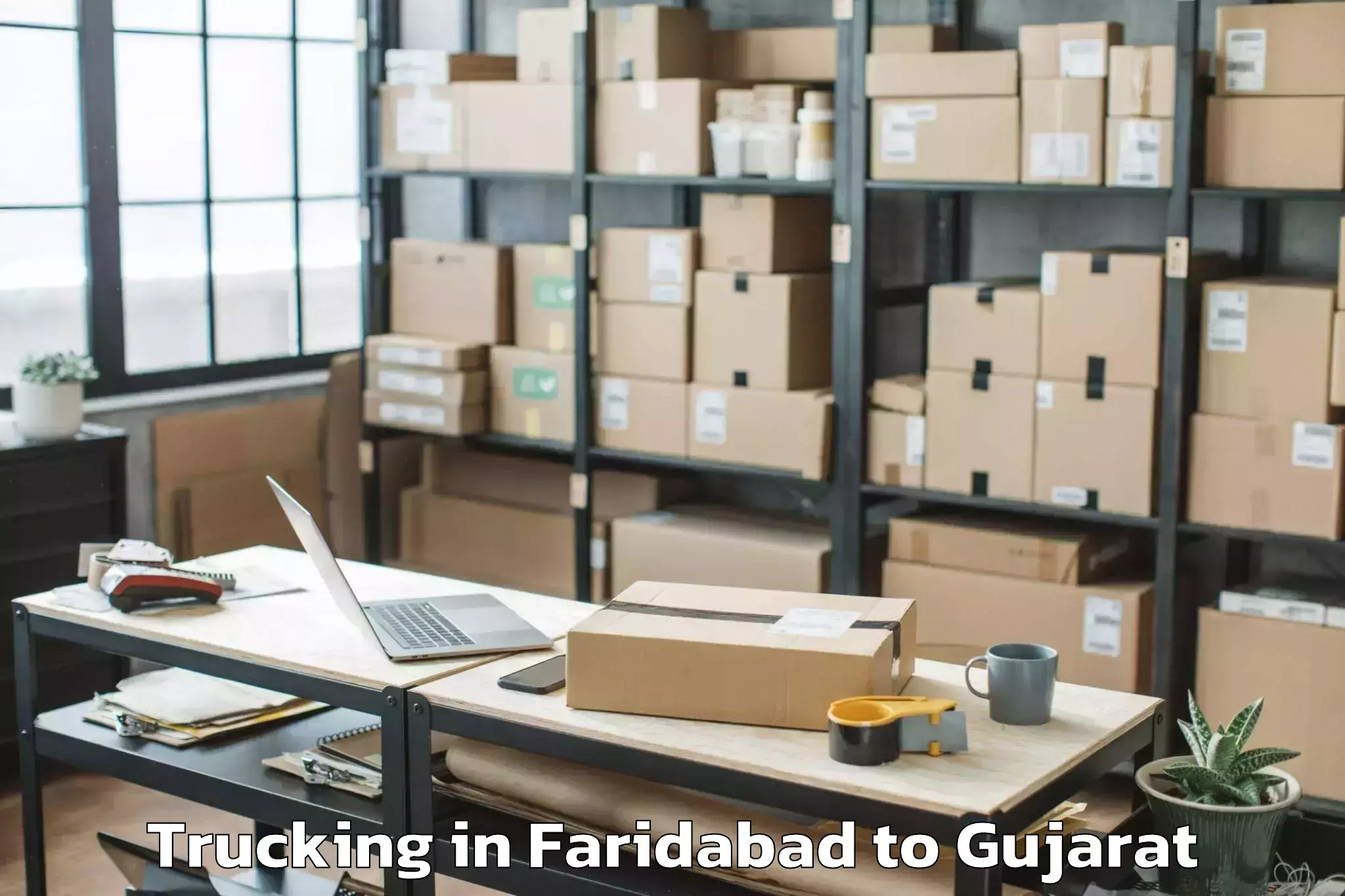 Book Your Faridabad to Delvada Trucking Today